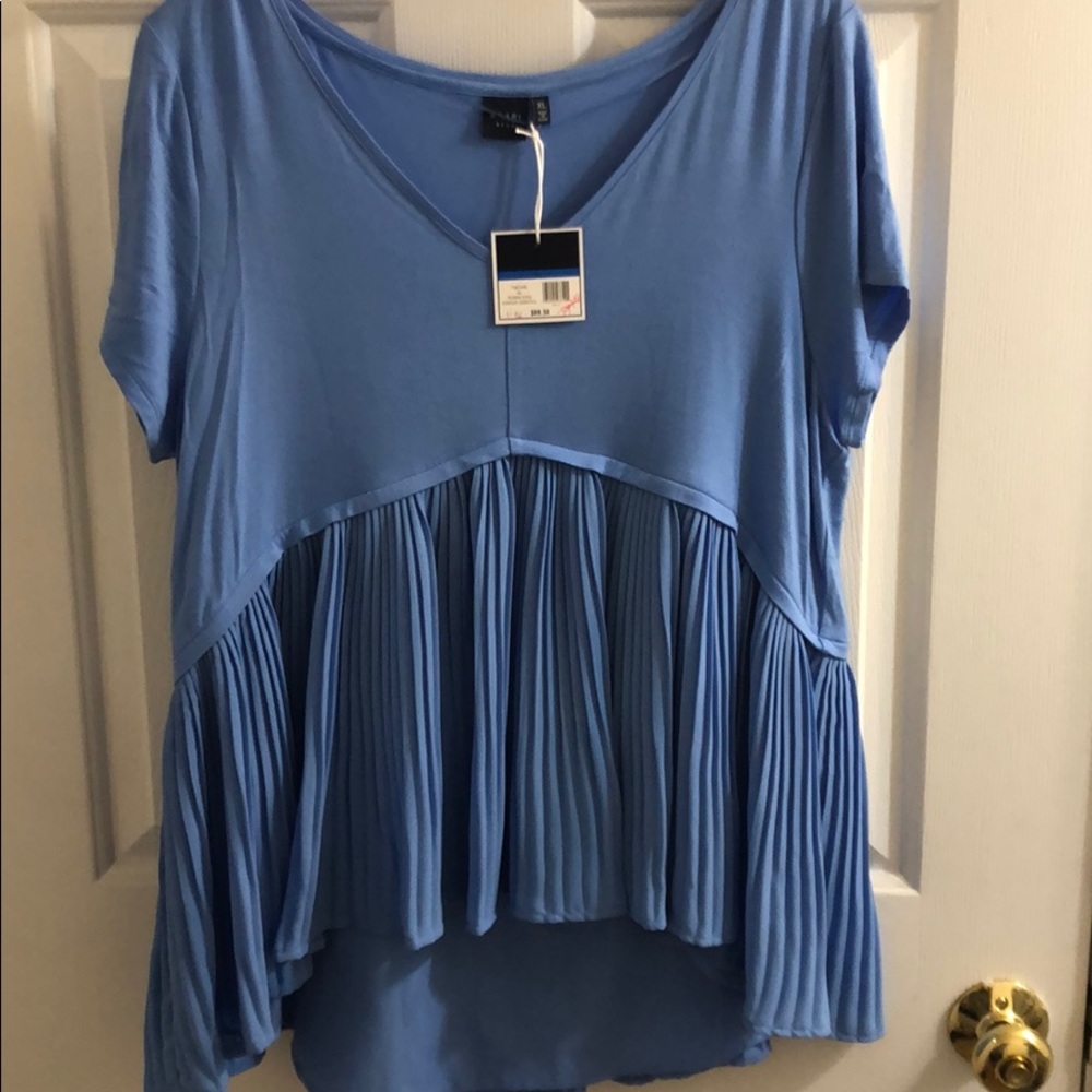 Blue top with accordion style detail